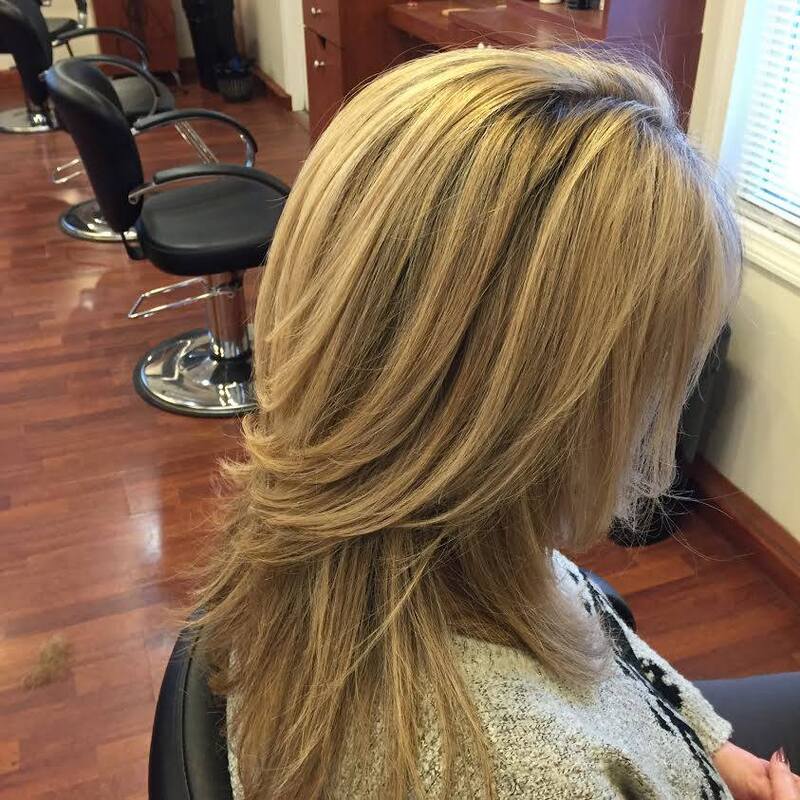 Blonde color and layered hair style