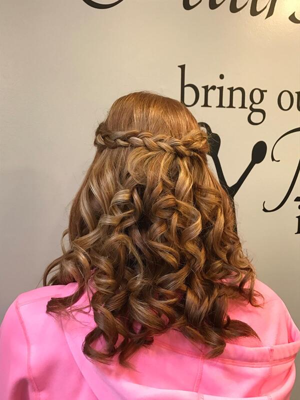 Prom style with braid crown and curls in back