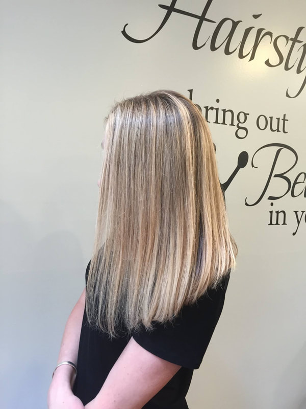 Blonde highlights and straight styling